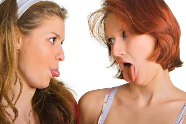 Put out tongues — Stock Photo, Image