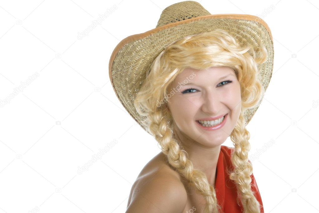 Young girl in a straw western hat