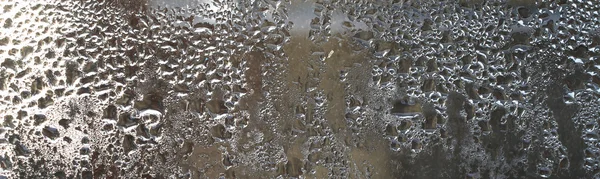 Капли воды на стекле — стоковое фото