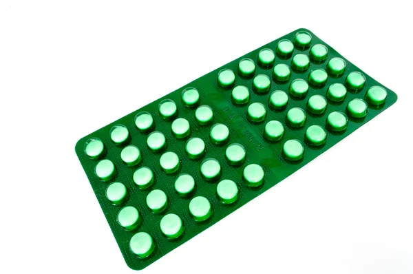 stock image Green plate of tablets