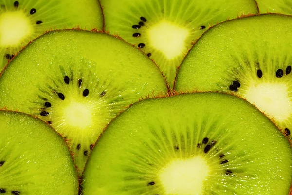 Pozadí světlé šťavnaté kiwi — Stock fotografie