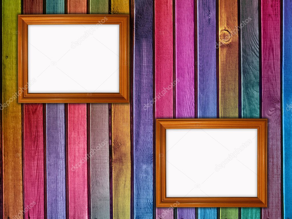 Colorful wooden wall with two frames