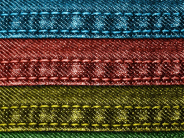 Многоцветные джинсы фон — стоковое фото