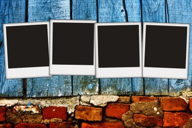 Vintage wall with blank photos on it clipart