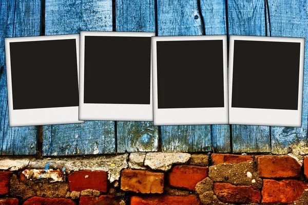 Vintage wall with blank photos on it — Stock Photo, Image