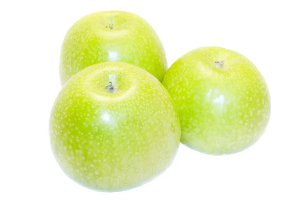 Beyaz bitti izole üç yeşil elma — Stok fotoğraf