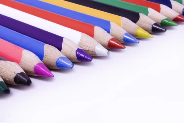 Um conjunto de lápis de madeira velhos coloridos — Fotografia de Stock
