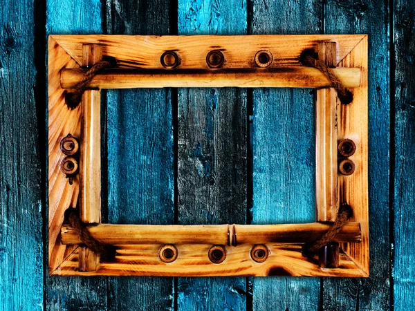 Frame onl wooden wall — Stock Photo, Image