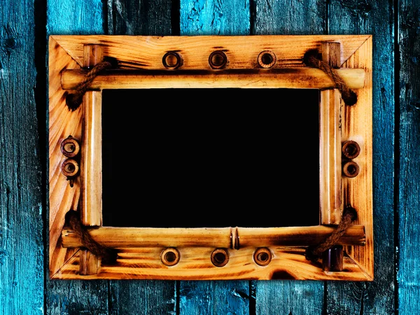 Frame onl wooden wall — Stock Photo, Image
