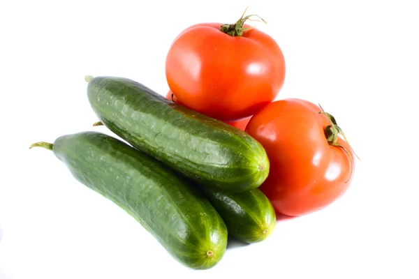 Tre gurkor och tomater — Stockfoto