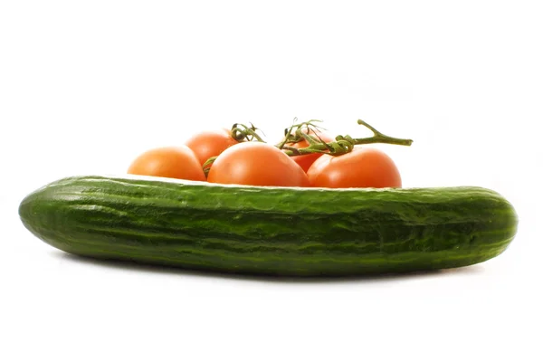 Tomatoes and cucumber — Stock Photo, Image