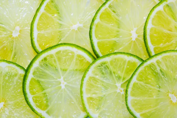 Juicy lime background — Stock Photo, Image