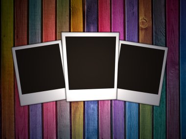 Wall with three blank photos on it clipart