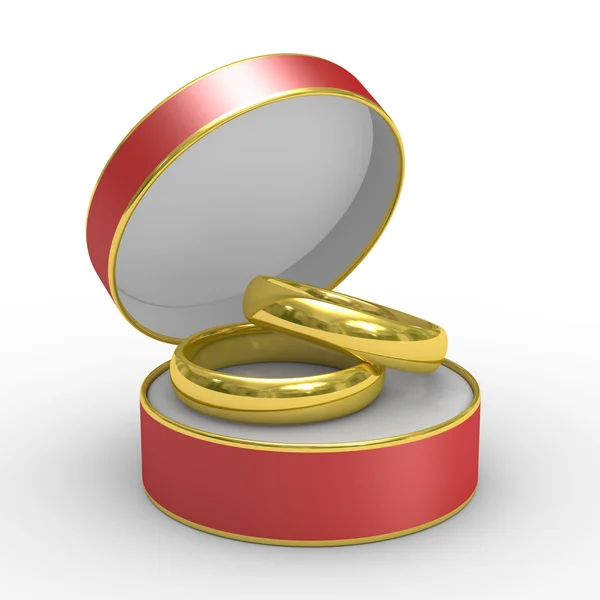 Červený rámeček s dvěma snubní prsteny — Stock fotografie