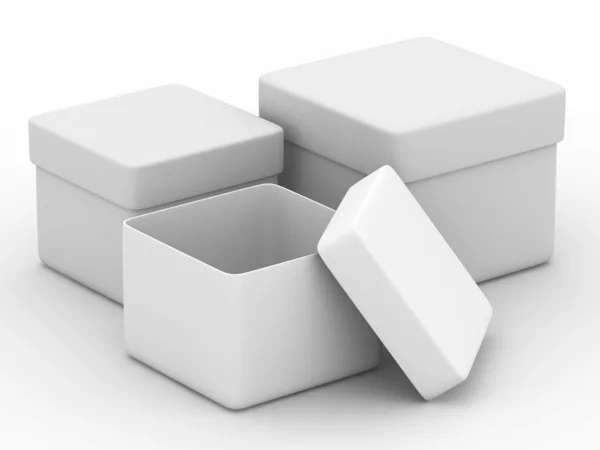 Tre scatole su sfondo bianco . — Foto Stock