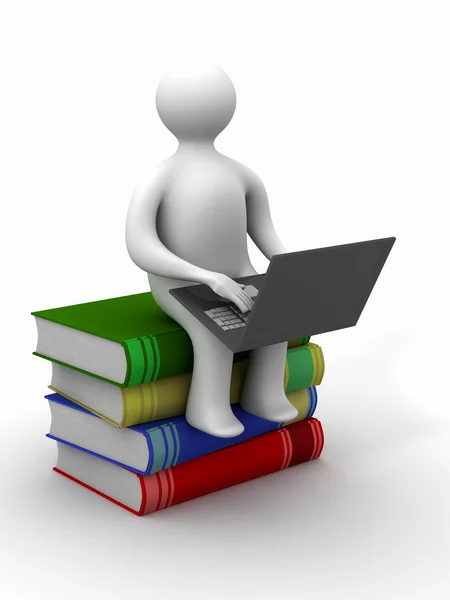 Student met de laptop zitting op boeken — Stockfoto