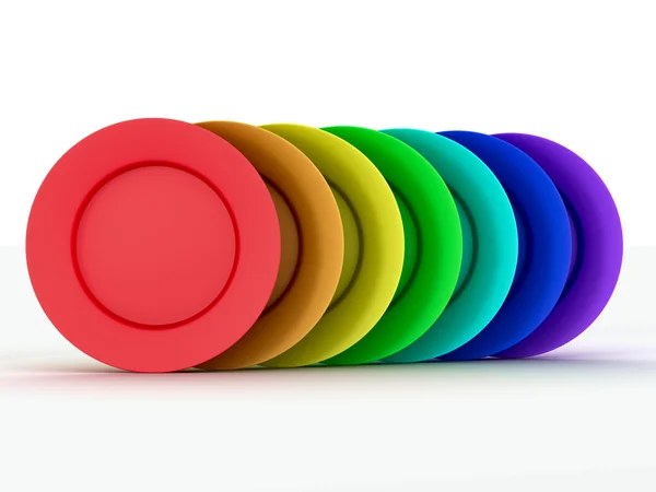 Sada talířů v barvách duhy — Stock fotografie