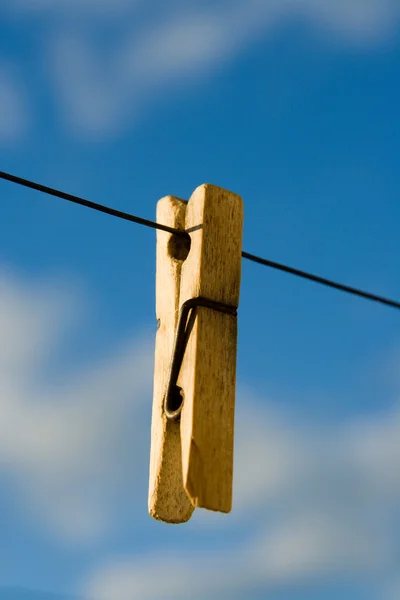 stock image Wooden clothespin on a wire