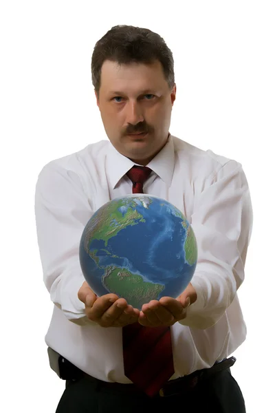 En mann som holder en planet i hender – stockfoto