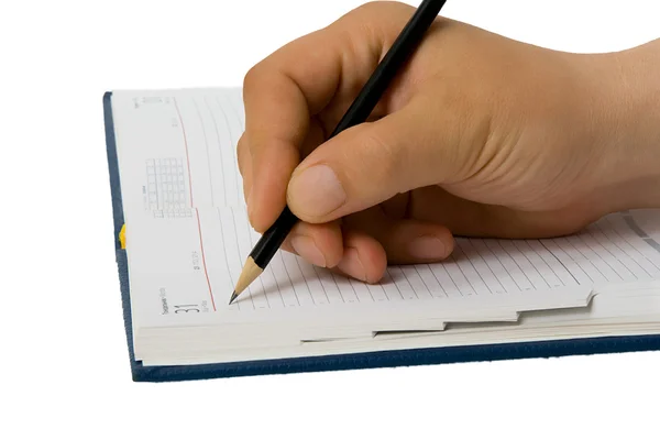 Χέρι που γράφει σε ένα σημειωματάριο — Φωτογραφία Αρχείου
