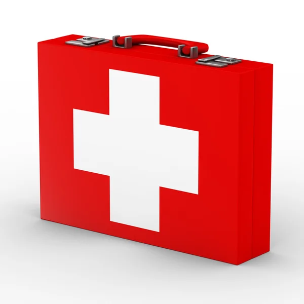 Красный чемодан с белым крестом — стоковое фото
