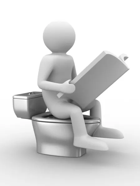 Muž sedí na WC mísu s časopisem — Stock fotografie