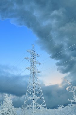 High voltage tower. winter. clipart