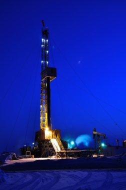 Drilling Rig at Night clipart