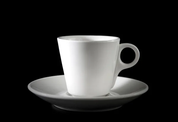Witte cup op een zwarte — Stockfoto
