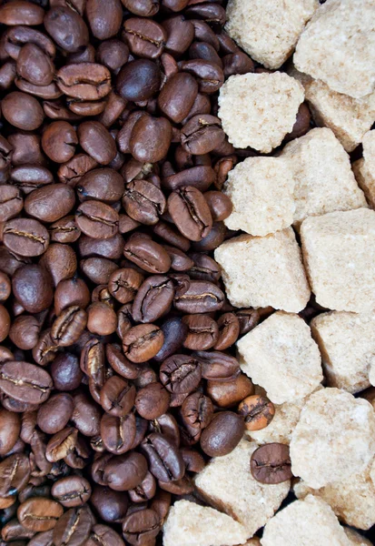 Rietsuiker en koffie bonen — Stockfoto
