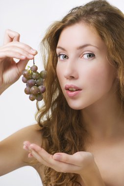 Eating grapes clipart