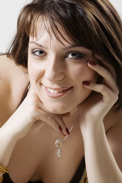 Atrakcyjna kobieta uśmiechając się — Zdjęcie stockowe