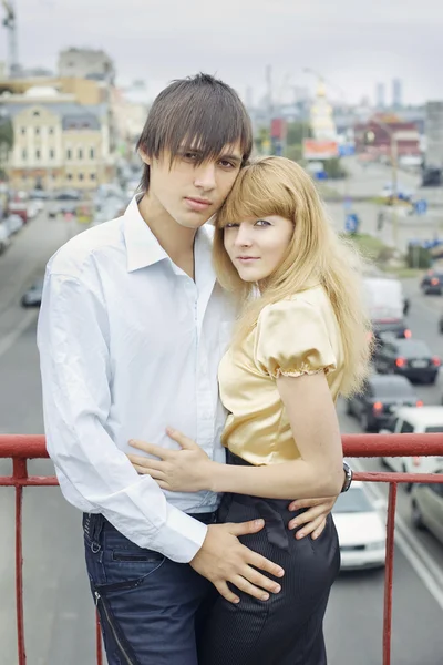 Portrait of couple in love on the bridge — Stock Photo, Image