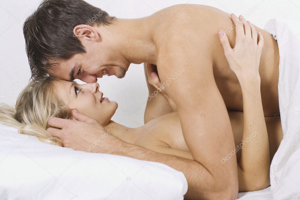 Happy couple on bed