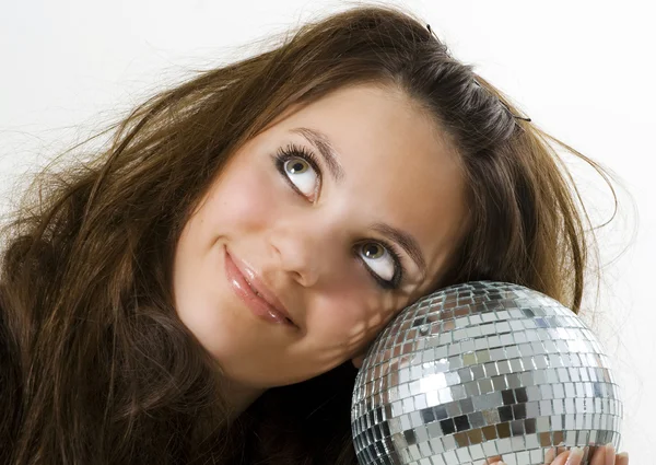 Menina segurando uma bola de discoteca — Fotografia de Stock