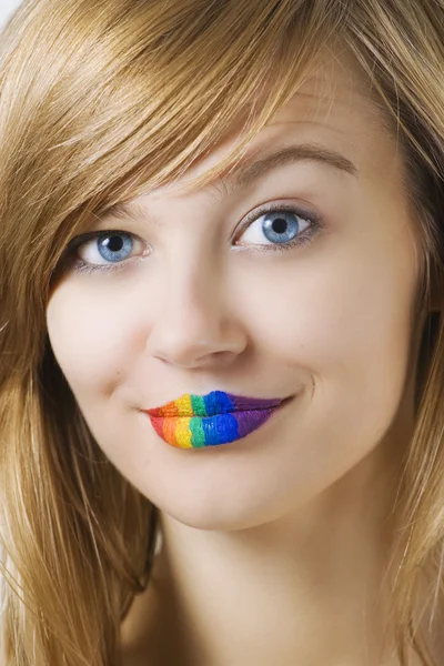Surprised woman with rainow lipstick — Stock Photo, Image
