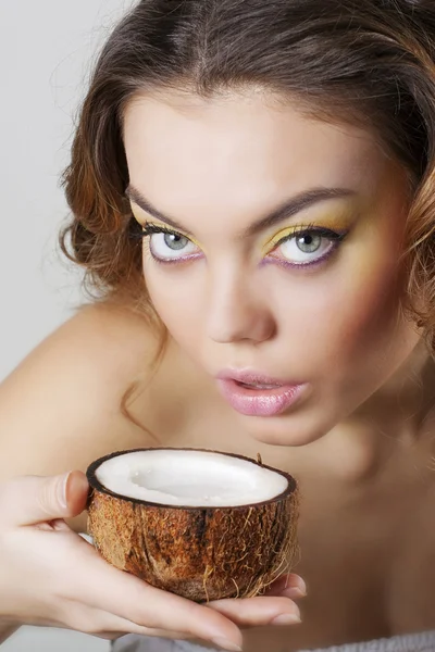 stock image Beautiful woman drinking coconut milk