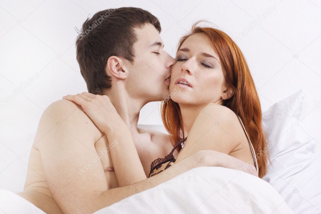 Couple Kiss Hd Porn - Young couple kissing at bedroom Stock Photo by Â©krivenko 2470743