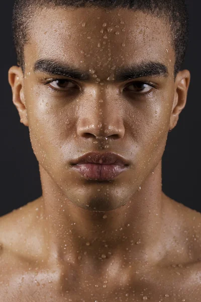 Face of man with water drops — Stock Photo, Image