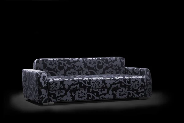 Sofá moderno sobre un negro — Foto de Stock