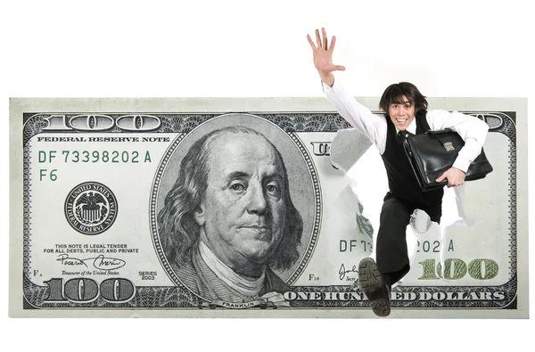 Jovem empresário salta através do dólar — Fotografia de Stock