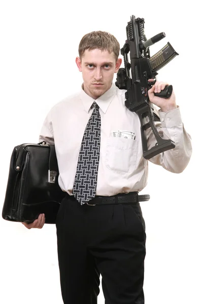 Молодой целеустремленный менеджер с пистолетом — стоковое фото