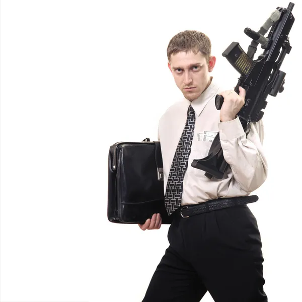 Jovem gerente intencional com arma — Fotografia de Stock