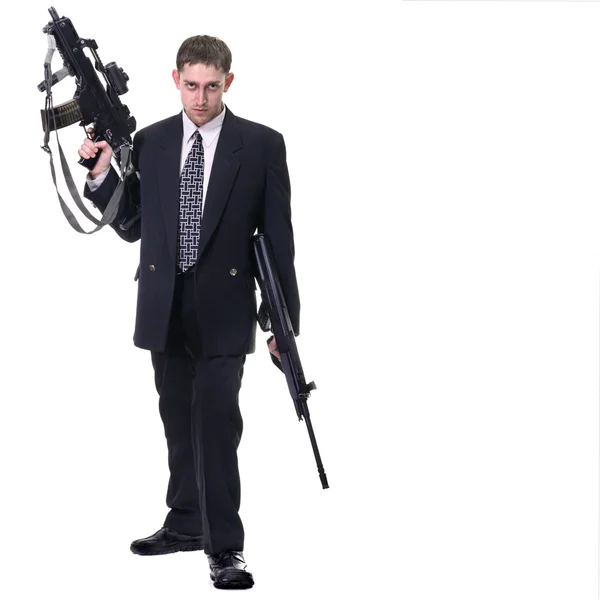 Young purposeful manager with gun — Stock Photo, Image