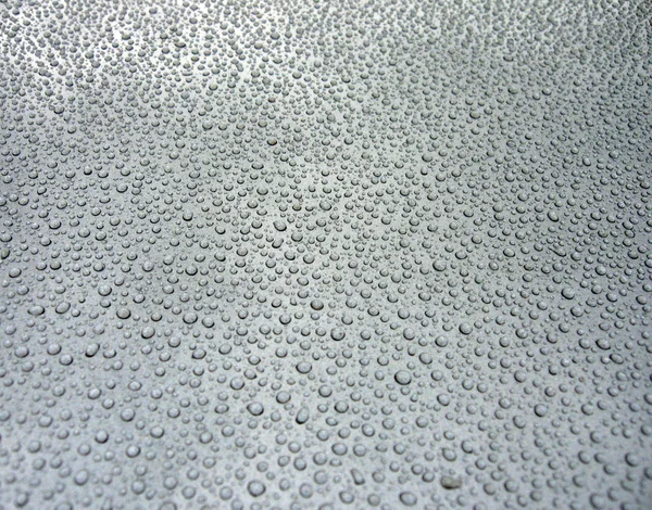 Stock image Water droplets on a gray background