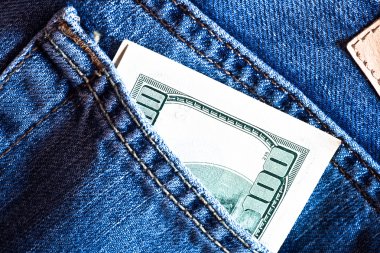 Blue jeans pocket with hundred banknote clipart