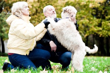 Family embrace irish soft coated wheaten clipart