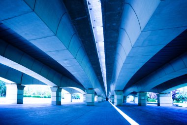 Under the bridge in the gardens of Valen clipart