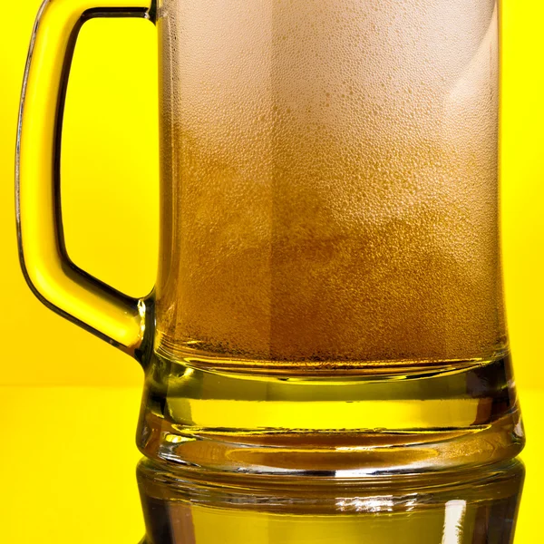 Mug of lager beer with bubles — Stock Photo, Image