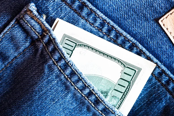 Blue jeans pocket with hundred banknote — Stock Photo, Image